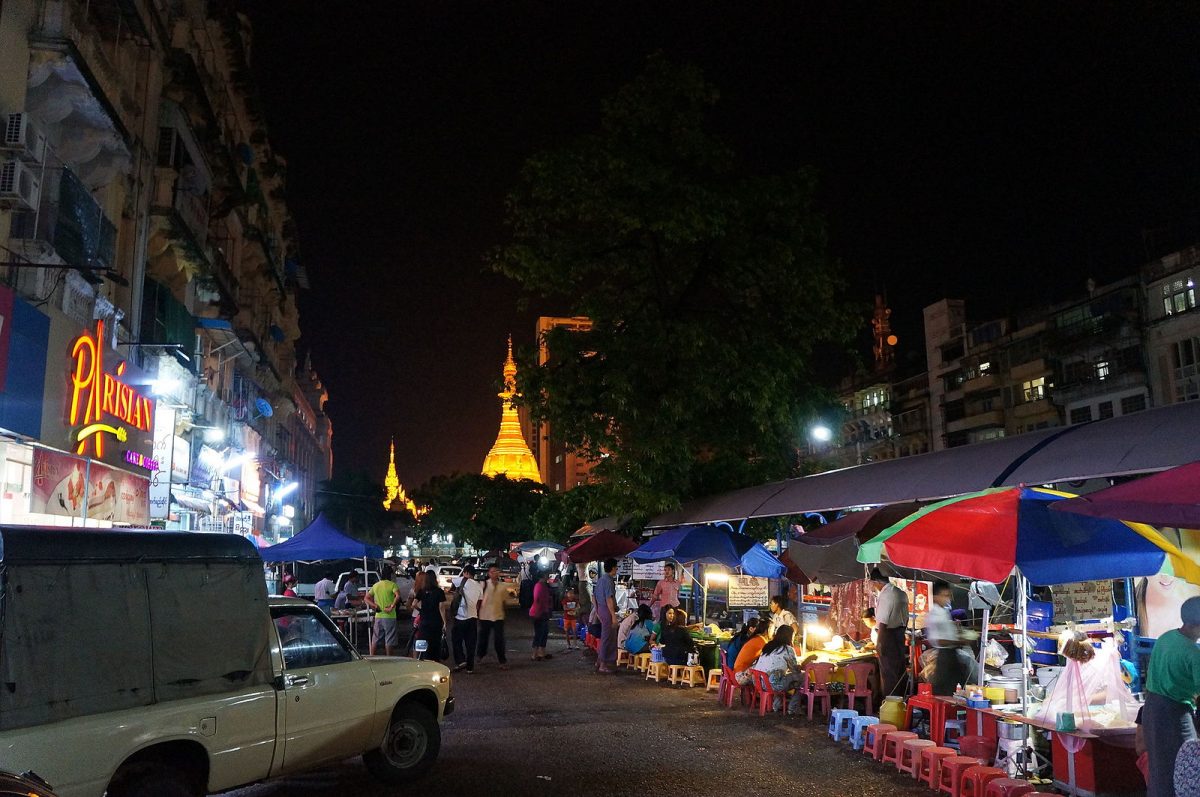 Street food stalls line up in Yangon at night