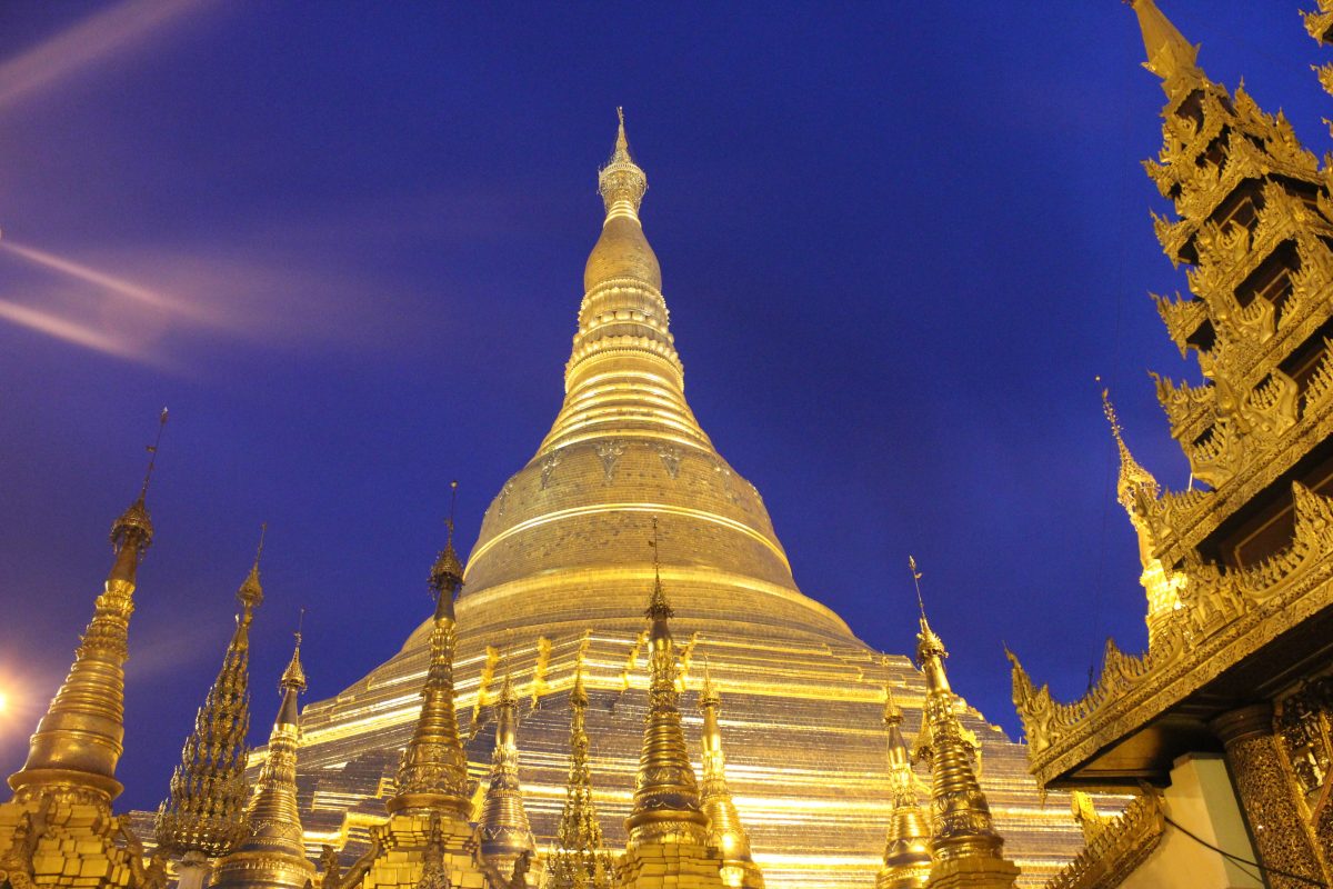 the Shwedagon Pagoda glistening at night
