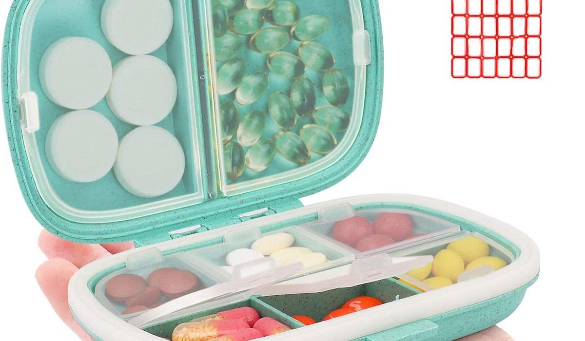 Light blue pill organizers with 8 compartments