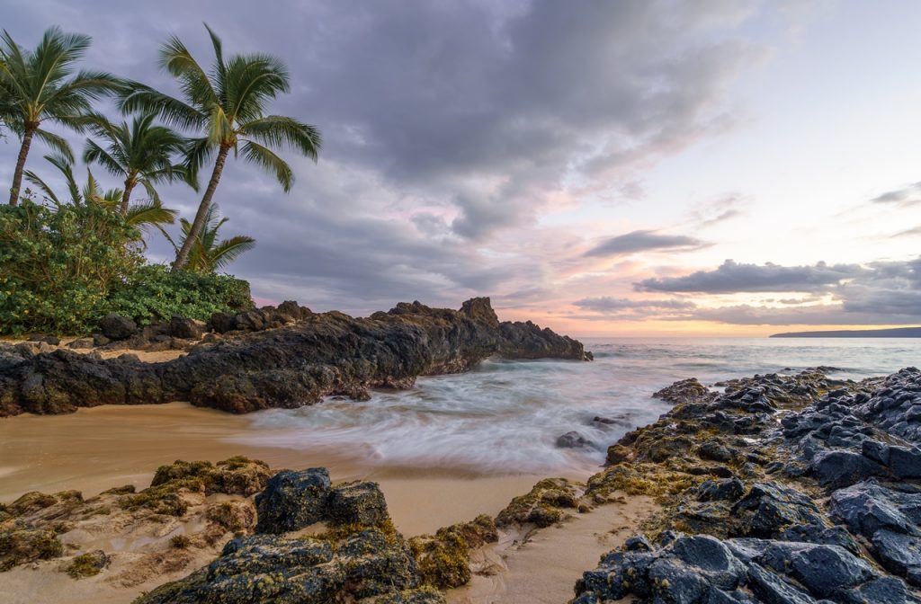 Rocky shores at a secret beach in Maui, one of the best places to visit in November