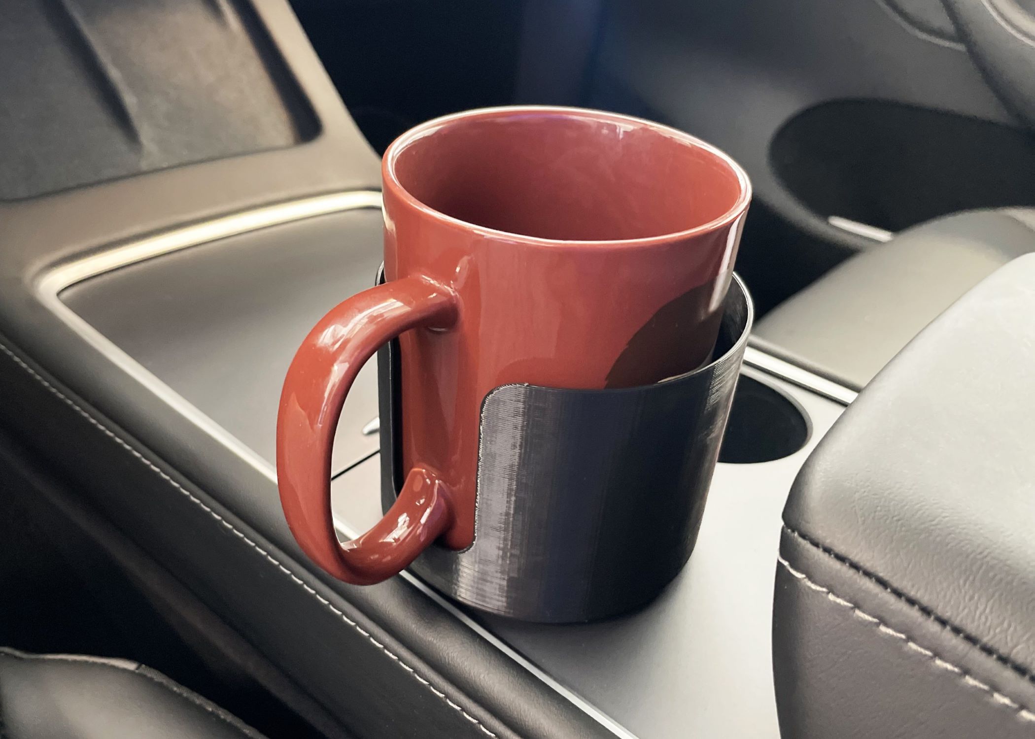 Does anyone have a design to make a car cupholder adapter for a 32