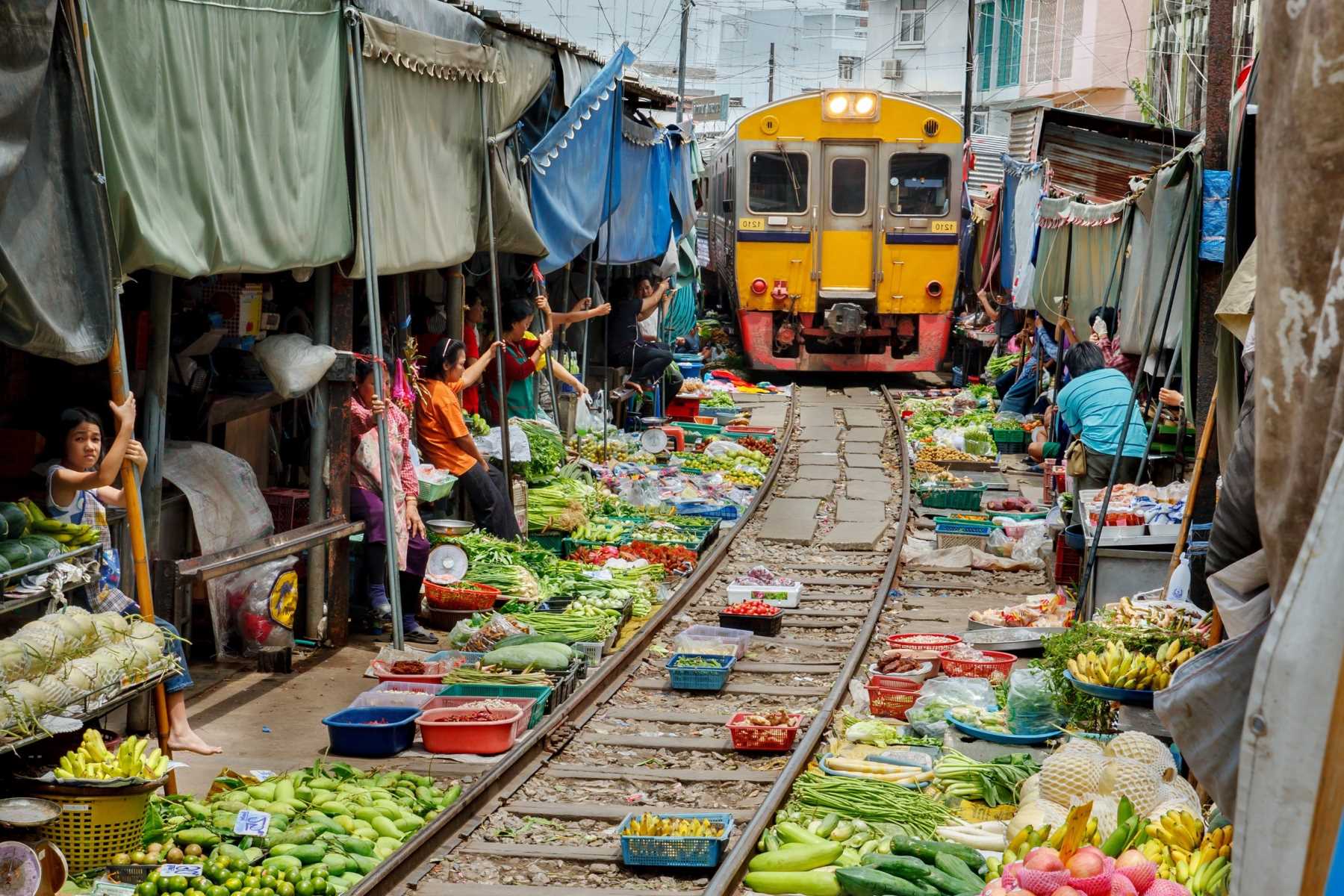 Secrets Of The Maeklong Railway Market In Bangkok Revealed | TouristSecrets